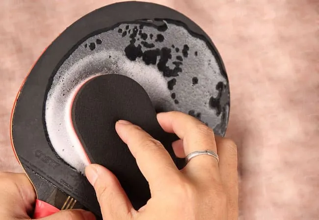 cleaning table tennis racket